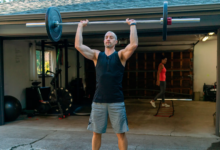 The overhead barbell press, known for its simplicity and effectiveness, not only targets the deltoids but also engages the core, triceps, and stabilizing